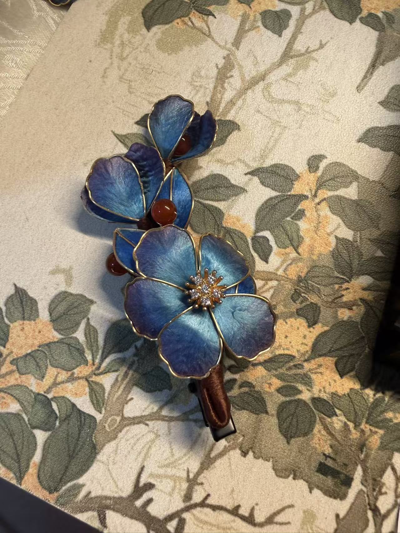 Blue Ronghua Hair Barrette worn in a traditional Chinese interior