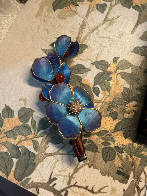 Blue Ronghua Hair Barrette worn in a traditional Chinese interior